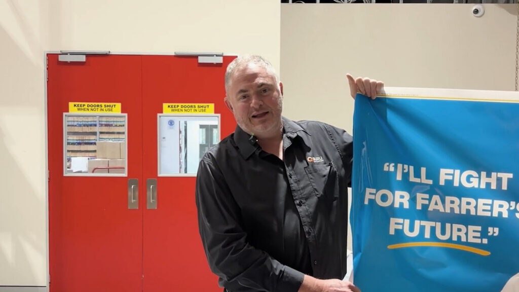 Election campaign banner being produced by Guru Labels, highlighting political printing services, election signage, and campaign materials in Australia.